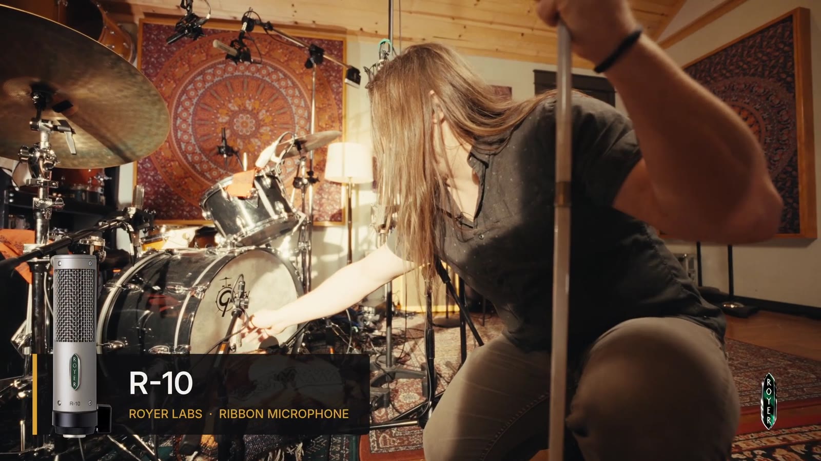 Royer R-10 ribbon microphone on the outside of the kick drum, with Bobby Holland adjusting it