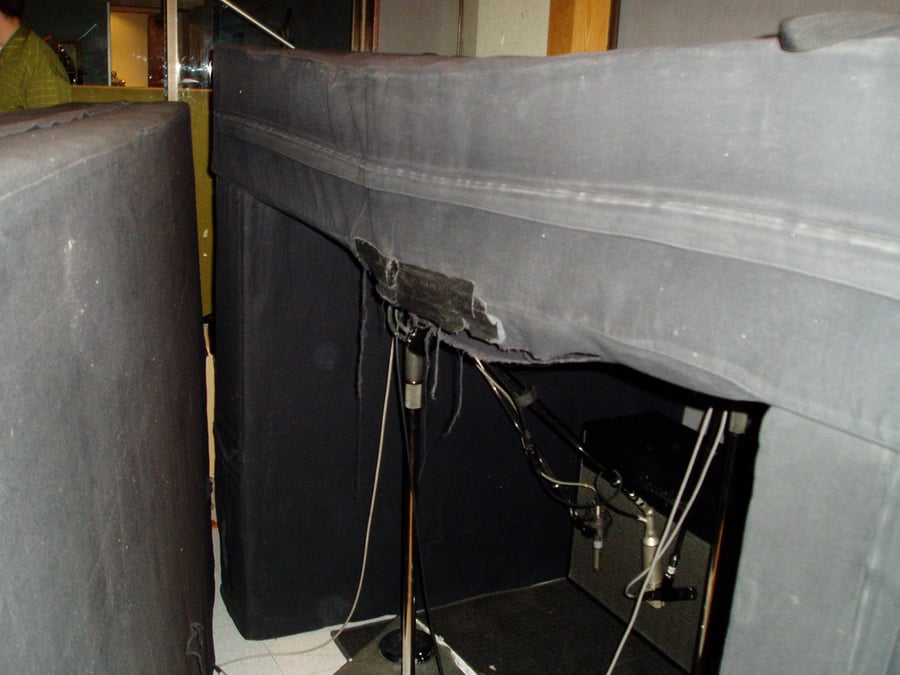 R-121 and a condenser mic on Ben Harper’s guitar cabinet