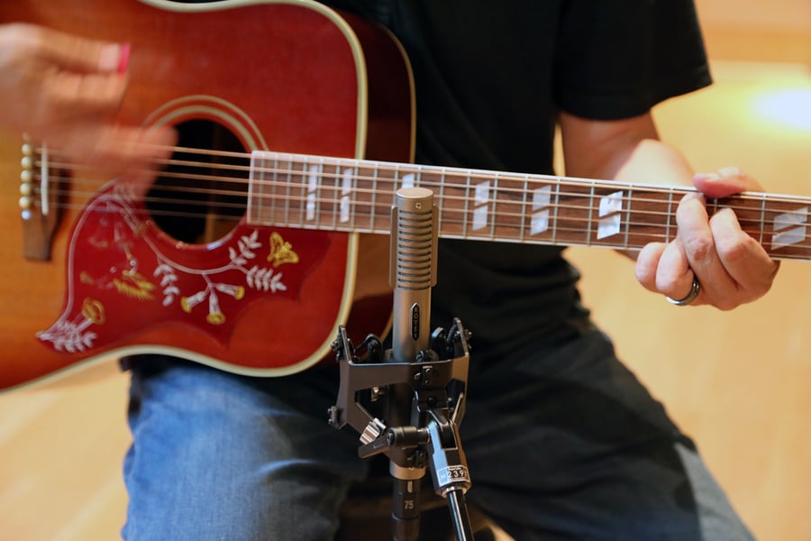 Acoustic guitar miked with a single backward R-122 near the 12th fret
