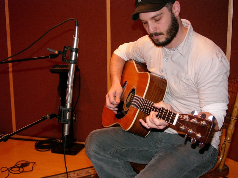 Blumlein pair of R-122s, one facing the guitar body and one facing the neck