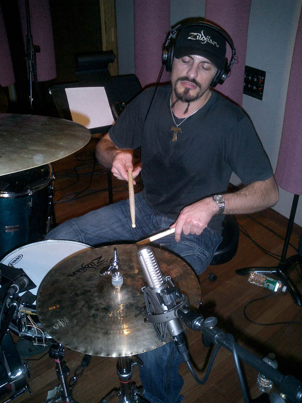 R-121 at a 45 degree angle on hi-hat in Bruce Swedien’s setup