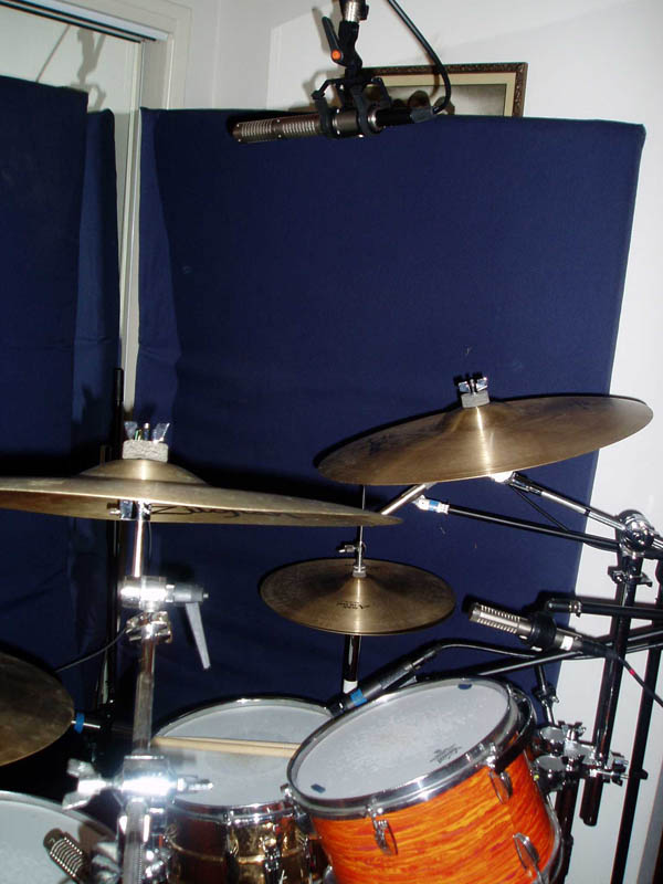 Drum kit miked with a stereo ribbon overhead and a ribbon mic on the kick drum