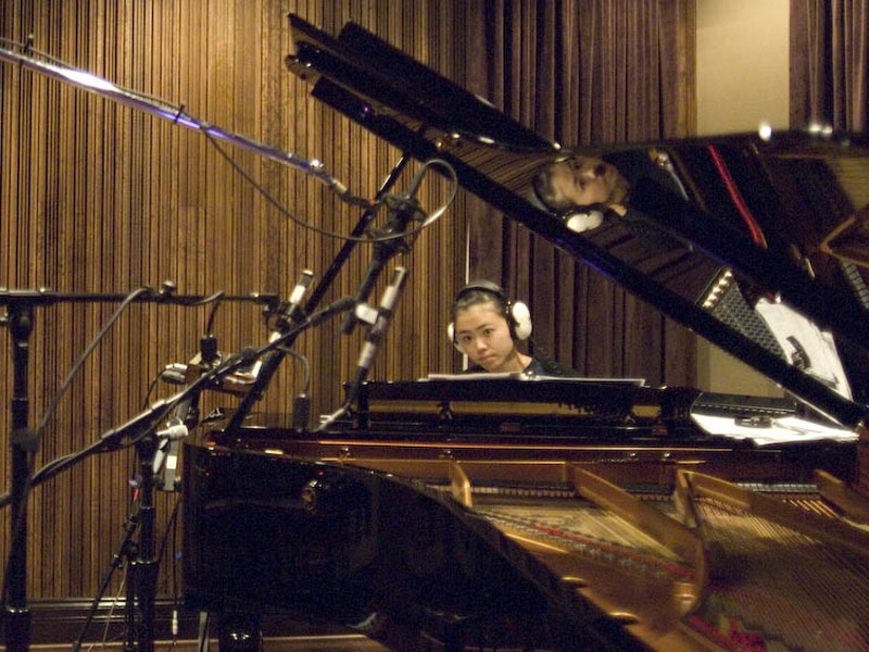 Hiromi at the piano with an SF-24 and two condenser mics placed just outside the lid