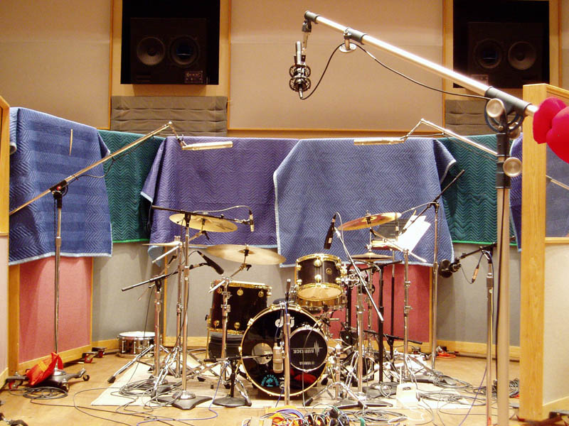 Stereo ribbon mic placed 6 to 8 feet high in front of the drum kit on a Meat Loaf session