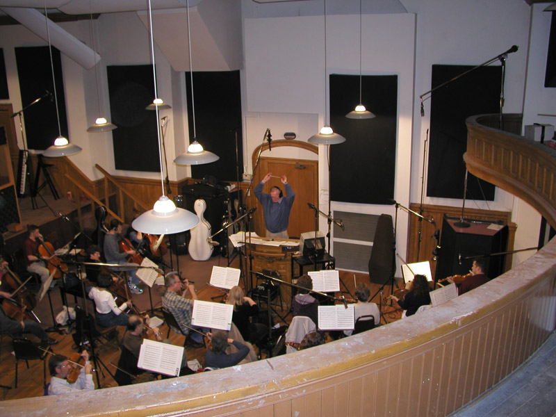 Small orchestra with spot mics on all sections and an SF-24 over the conductor’s head
